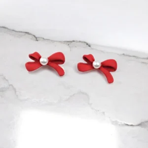 Moño rojo con perla x 2u