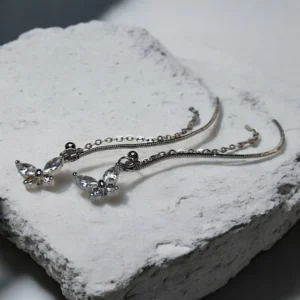 Dije mariposa cristal con cadenas x 1u