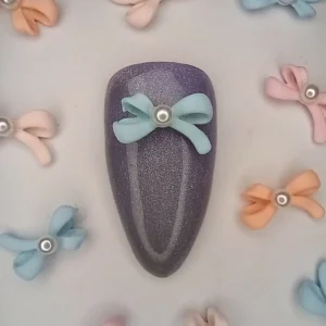 Moños con perla grandes x8 u